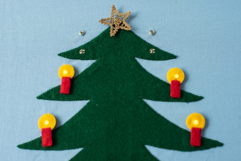 Page Christmas Tree with light-up candles